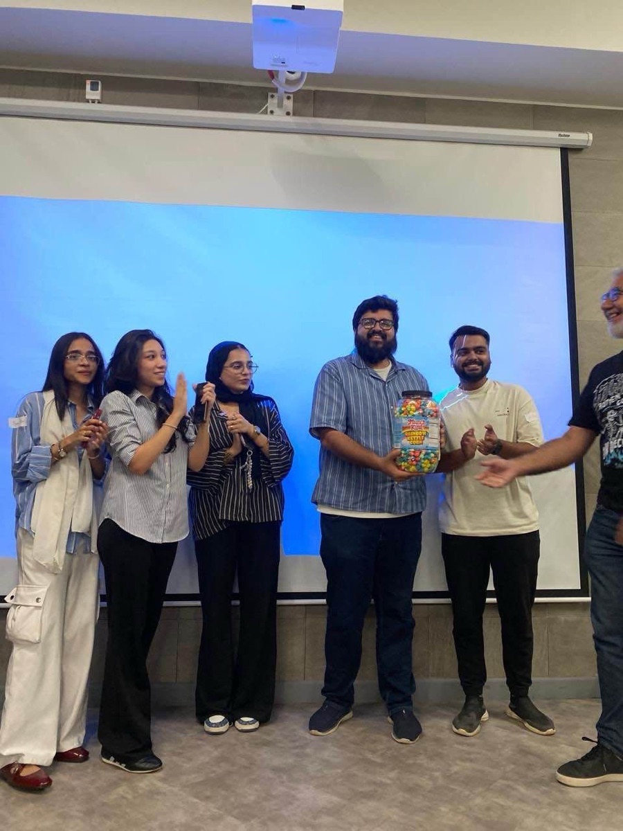 Anas's team taking first place at the Friends of Figma Karachi Makeathon.